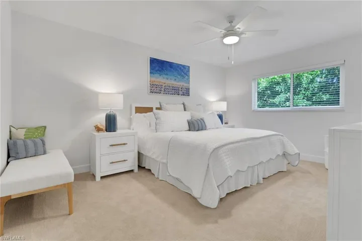 Bedroom featuring carpet flooring and a ceiling fan