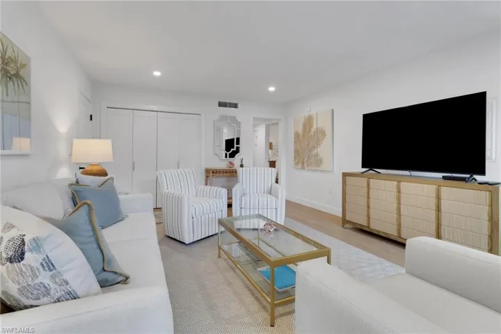 Living room featuring recessed lighting and wood finished floors