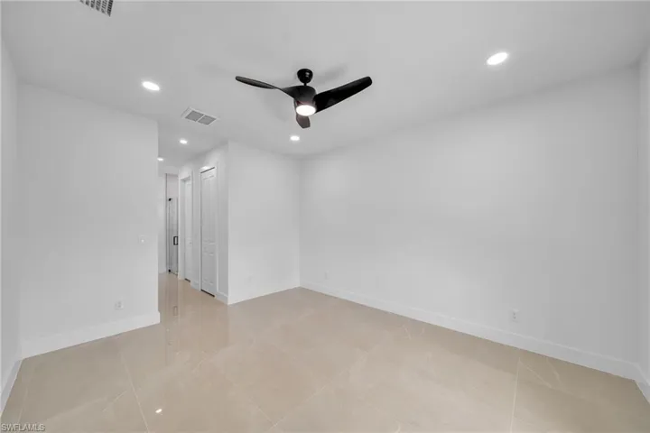 Spare room featuring ceiling fan