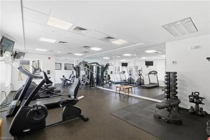 Gym featuring a drop ceiling