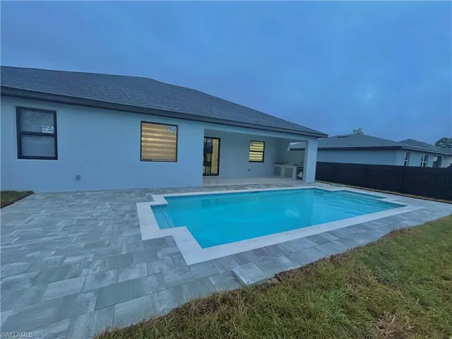 View of pool with a patio area