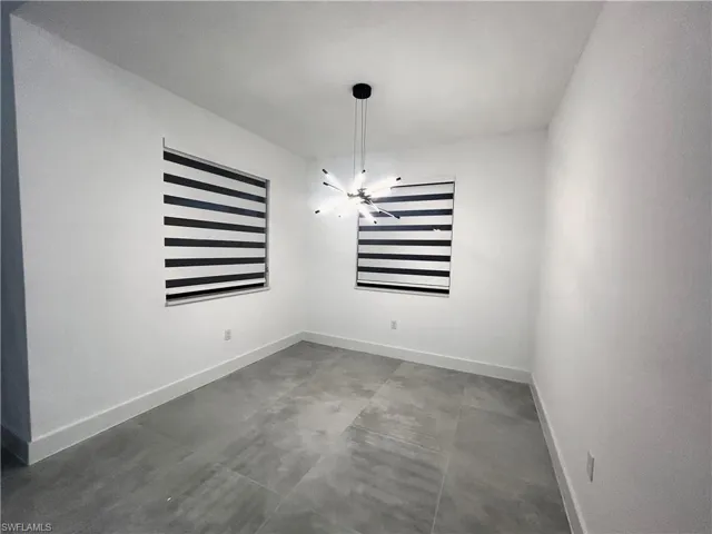Unfurnished dining area with ceiling fan