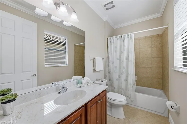 Guest Bedroom #1 Private bath leads to outside pool area