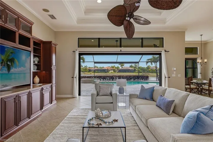 Great room trayed ceiling and tiled floor