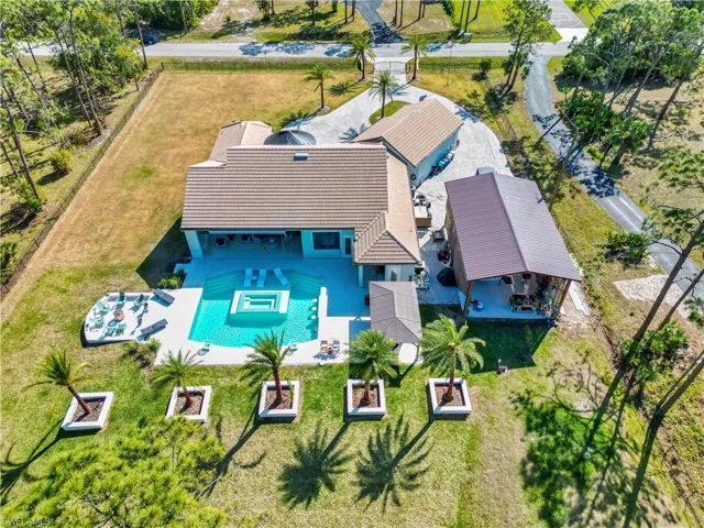 View from above of property featuring a pool