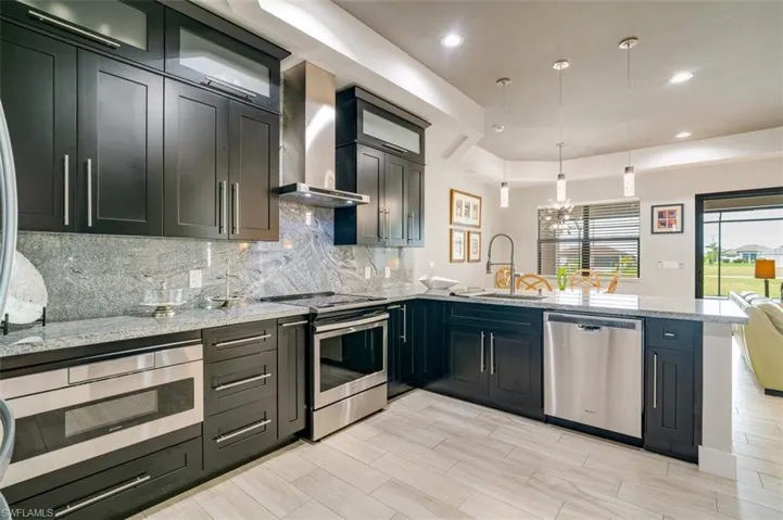 Custom cabinetry with upgraded appliances