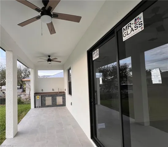 View of patio / terrace featuring exterior kitchen