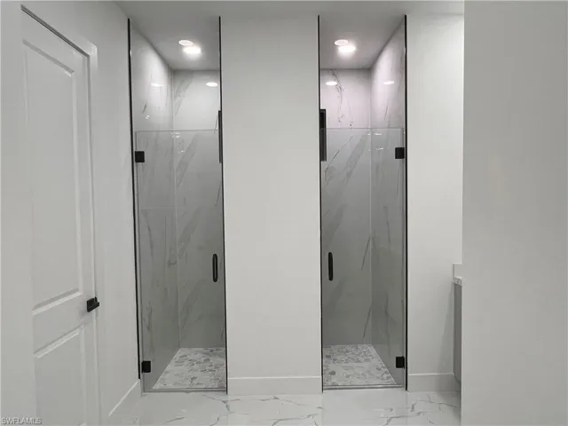 Bathroom featuring a shower with shower door