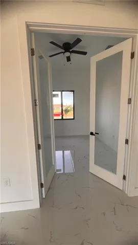 Hallway with french doors