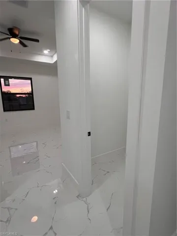 Bathroom featuring ceiling fan