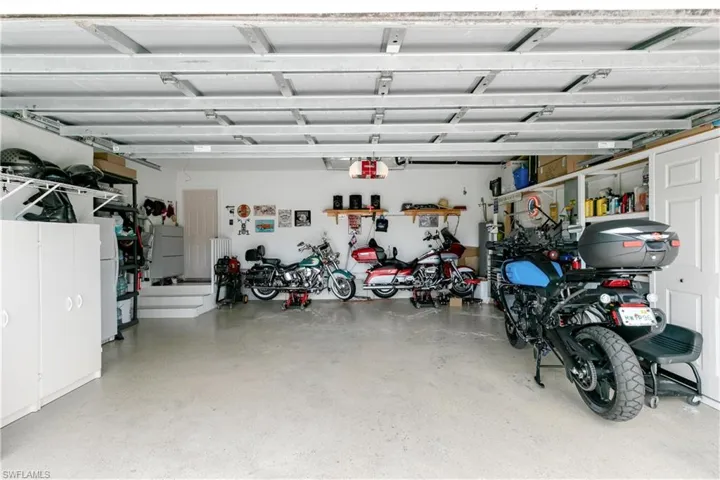 Garage is extra deep, can fit 2 cars plus motorcycles/scooters/storage