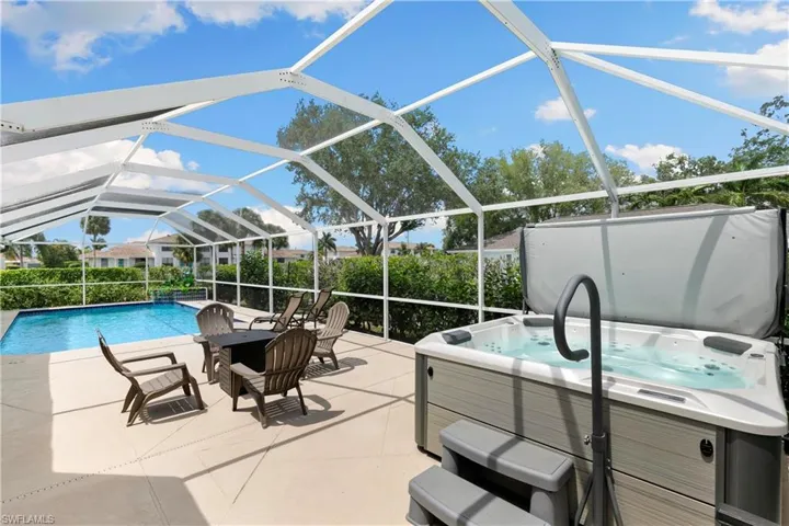Beautiful newer hot tub with pearl white interior