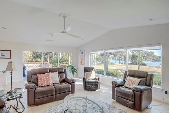 Roomy family room adjacent to the kitchen with amazing riverfront views