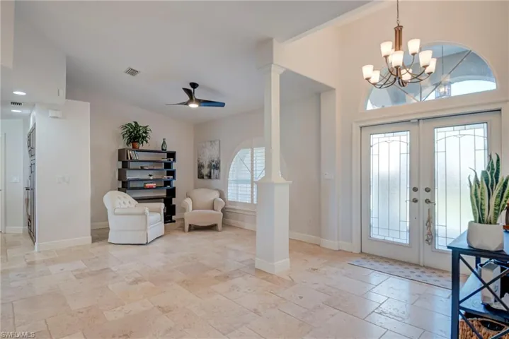 Double Door Entry and sitting room/dining area