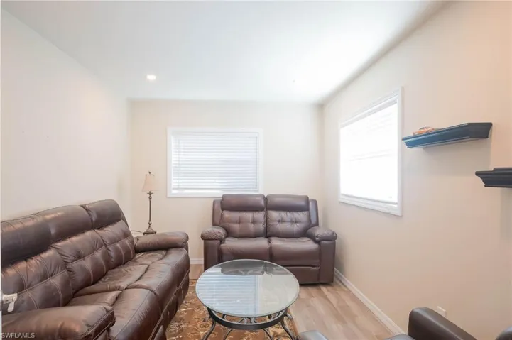 Room in garage with overhead storage.  Perfect for office or workshop or storage