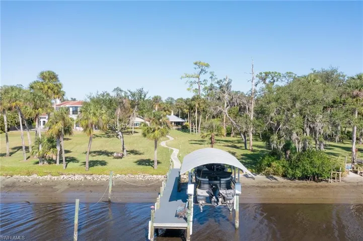 Boat dock and covered lift