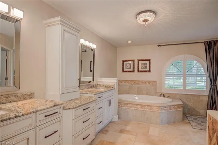 Dual Sinks, Level 5 Granite and Spa Tub