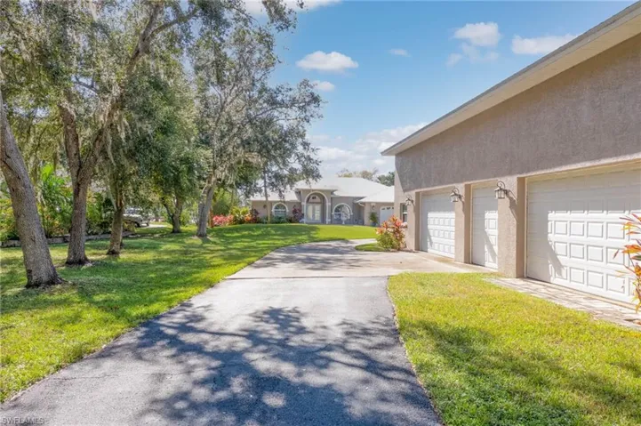 View of the home from the garage and driveway