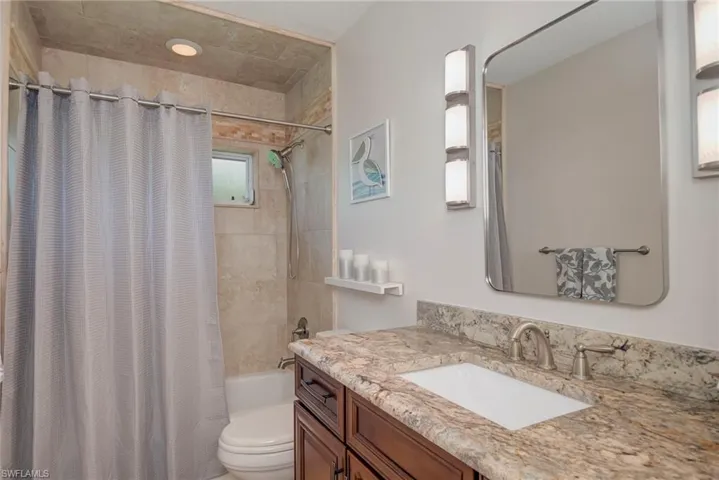 Guest Bath with updated fixtures and granite coutnertops