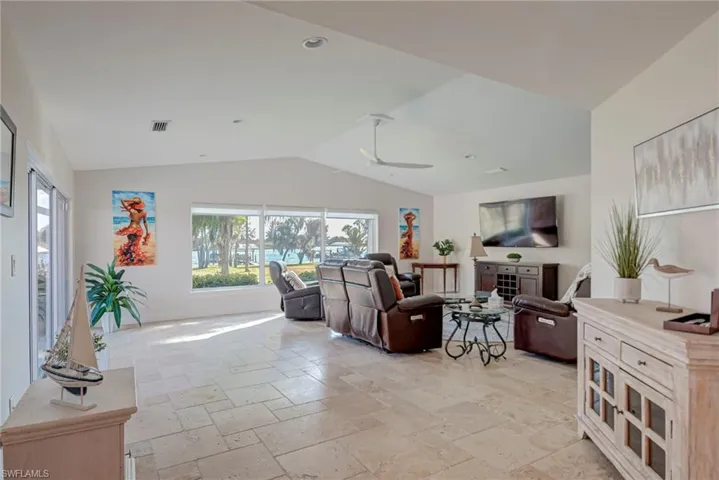Lots of natural light and travertine tile