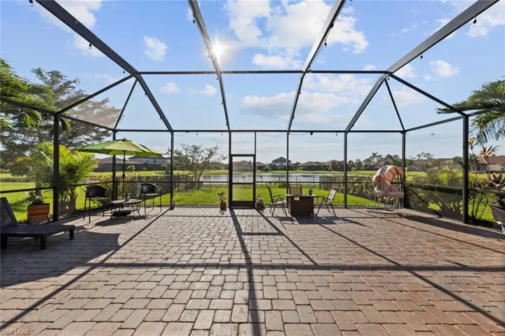 View of patio / terrace featuring glass enclosure