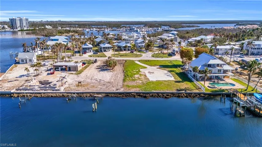 VIRTUALLY ENHANCED - Aerial view featuring a water view