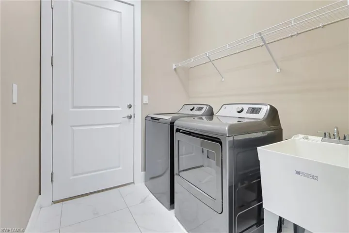 Laundry room including washer, dryer and laundry sink