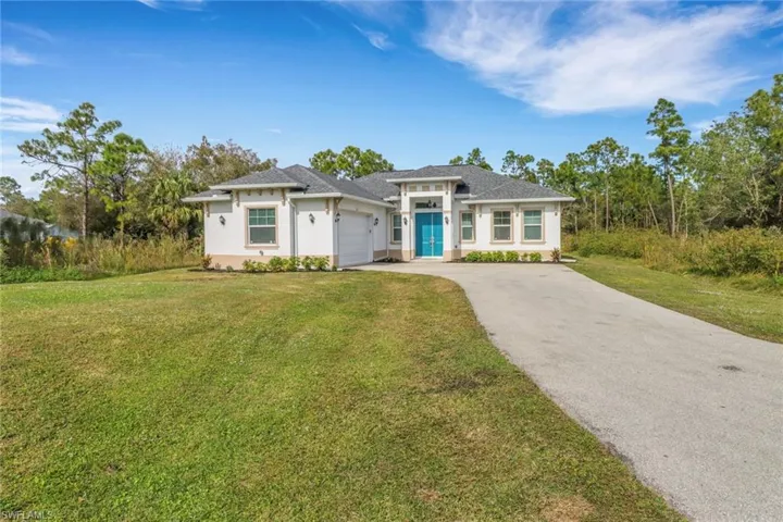 View of front of home featuring a side entry garage