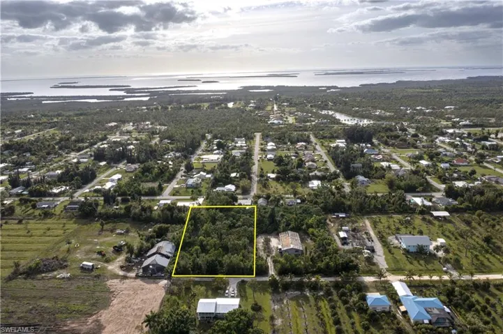 Looking West.  1.25+ acre property with home to right of this lot is also available for sale.