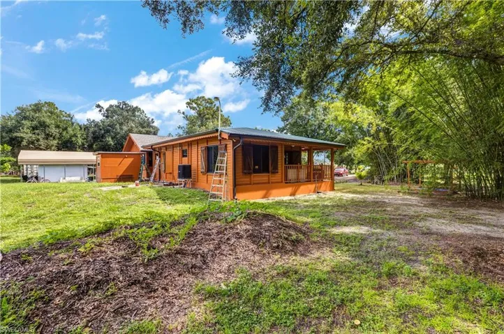 View of front of property with a front lawn