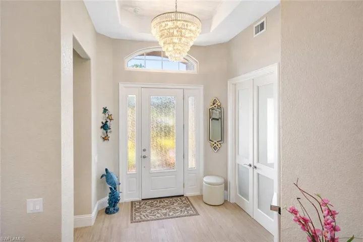 Grand Entry, Chandelier, Porcelain Tile Flooring
