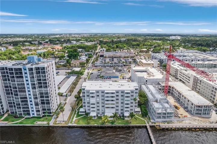 Bird's eye view with a water view and a view of city