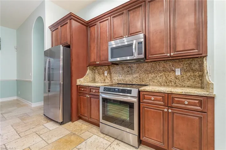 Kitchen with newer stainless appliances