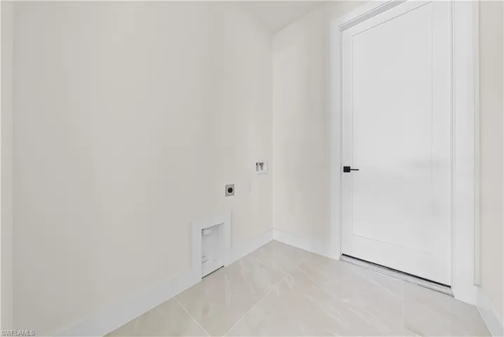 Laundry area featuring electric dryer hookup and hookup for a washing machine