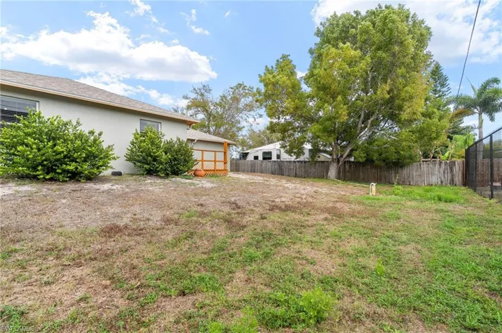 View of fenced backyard
