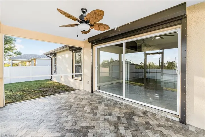 View of patio with ceiling fan