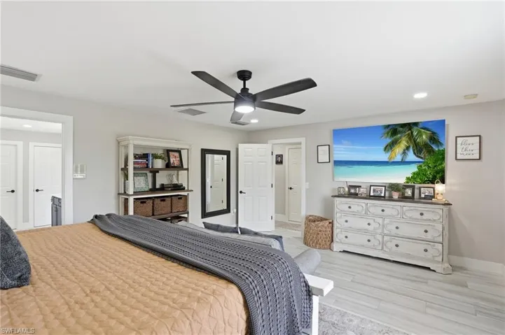 Light gray interior walls with white trim and multiple white doors