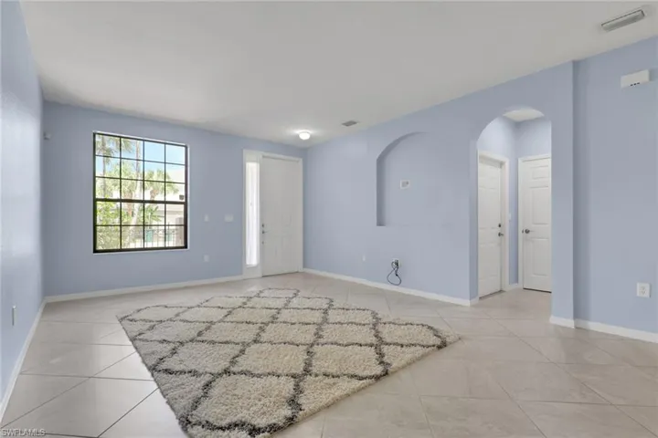Welcoming entryway with open floor plan.