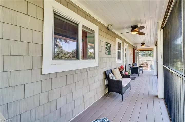Porch featuring a ceiling fan
