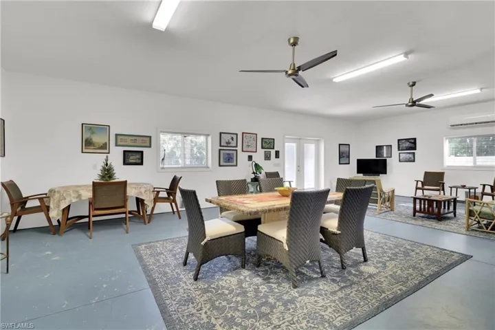 Great Room with concrete flooring, french doors, and plenty of natural light