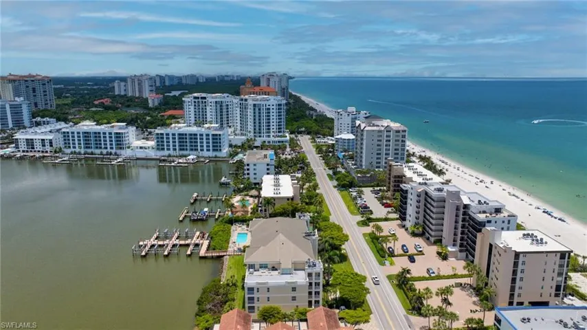 Coastal residences featuring waterfront access and a short distance to the sandy beach