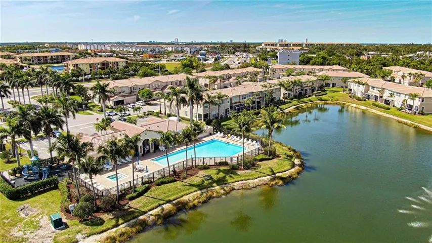 Aerial of community lake and clubhouse/pool