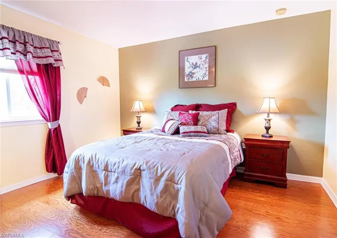 Upstairs Master bedroom with windowing to lake view