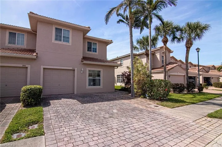 Front elevation view with paver driveway