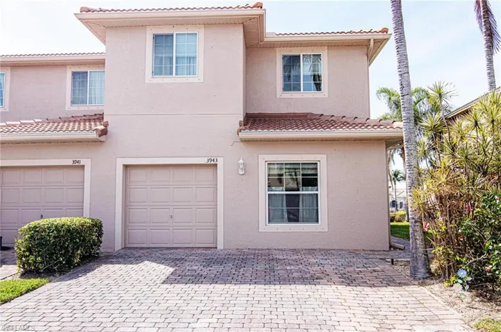 Front elevation view with paver driveway