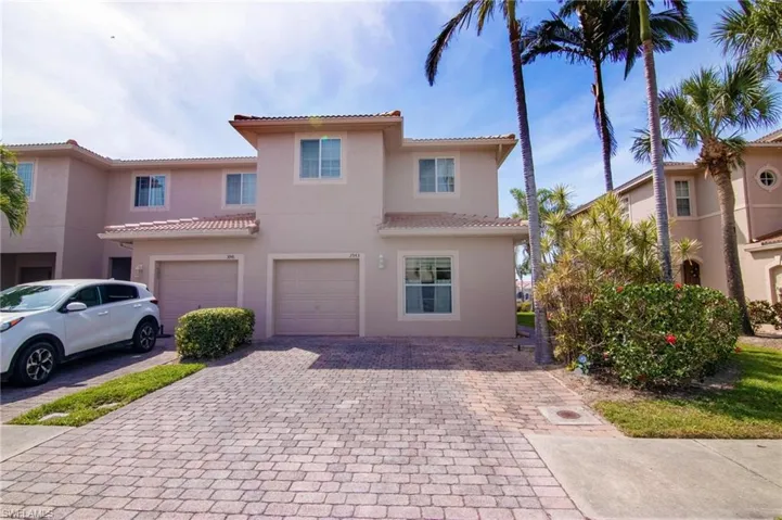 Front elevation view with paver driveway