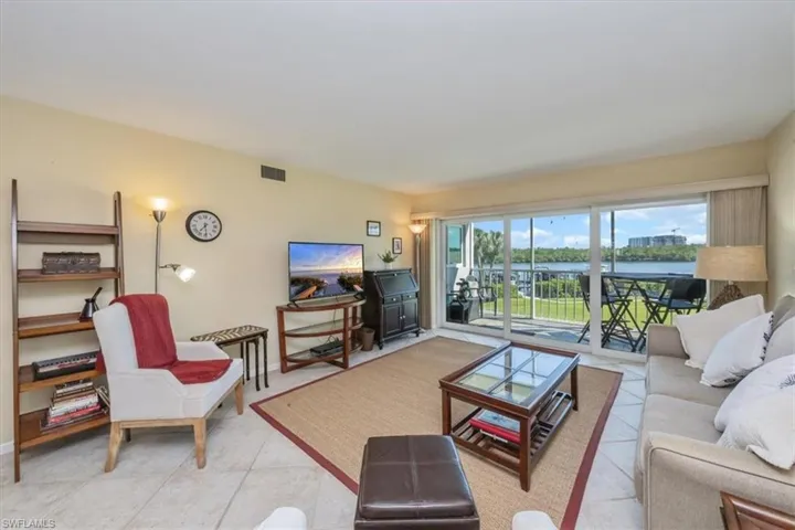 Living room featuring light tile patterned flooring