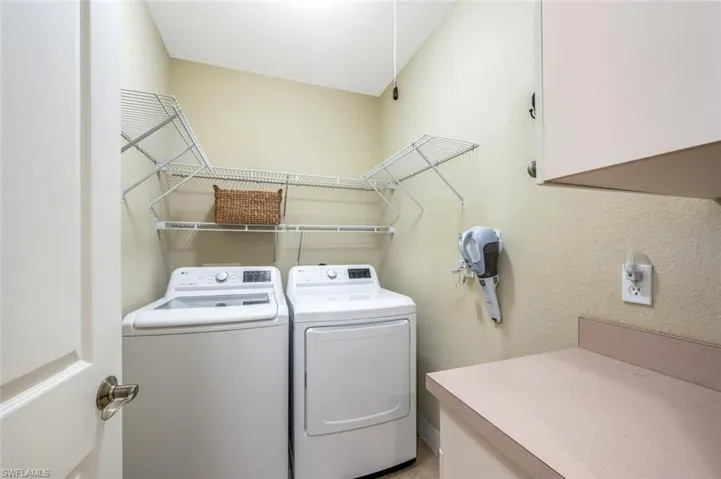 Laundry room with a door