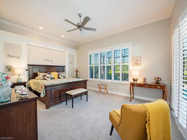 Expansive primary bedroom with access to the lanai