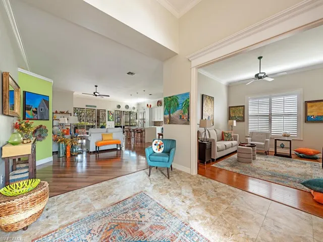 View from foyer of great room/kitchen and den